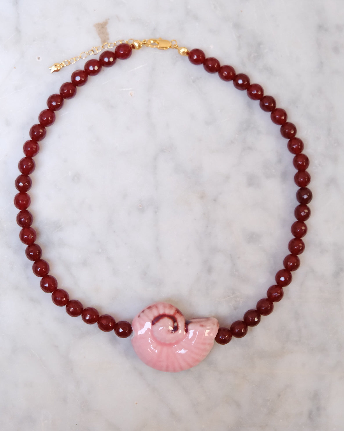 Gargantilla caracola rosada